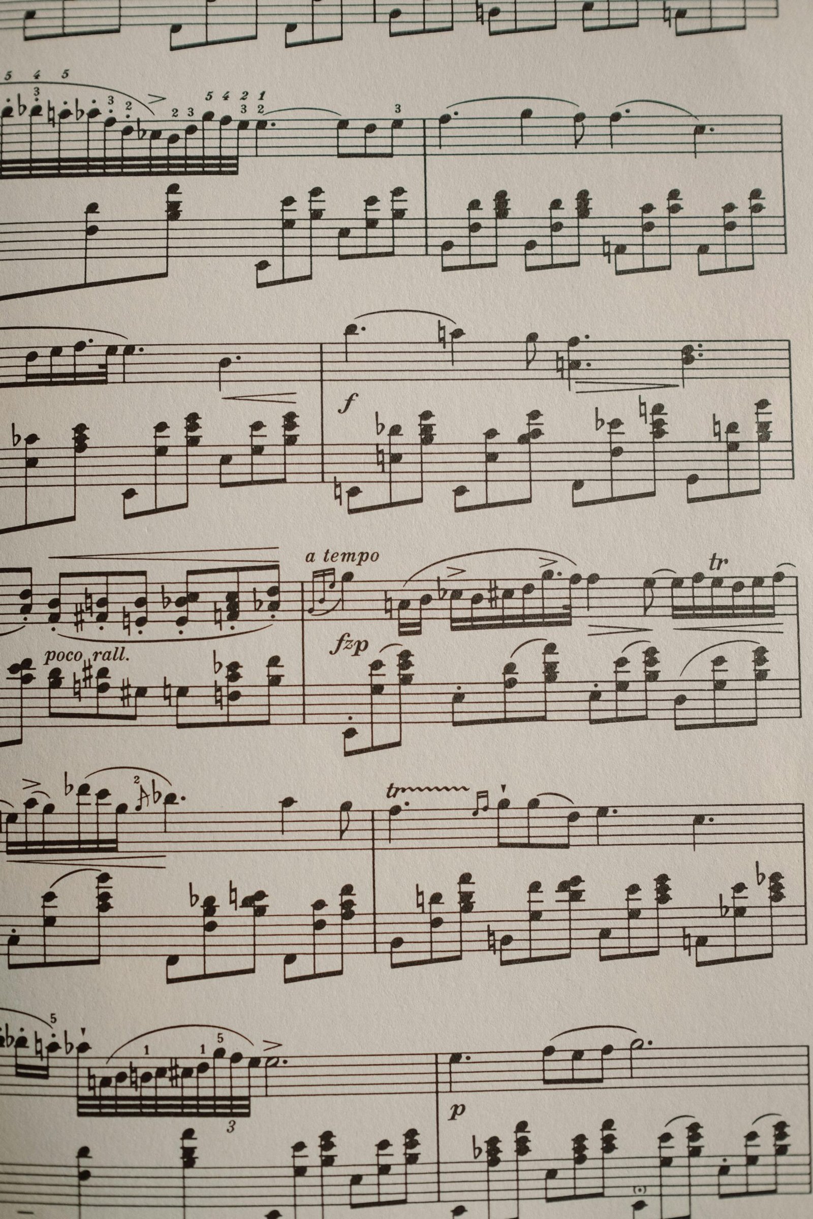 Close-up of a musical score featuring classical piano notation.